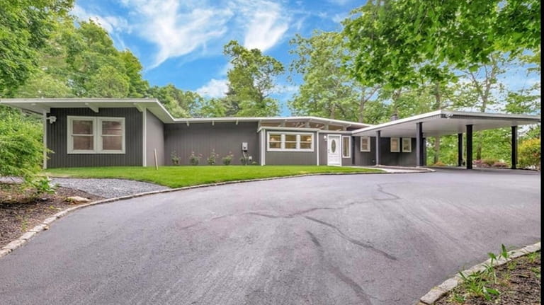 This $799,999 Smithtown home contains 2,200 square feet.