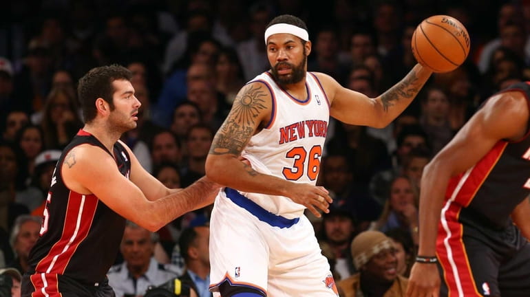Rasheed Wallace of the New York Knicks controls the ball...
