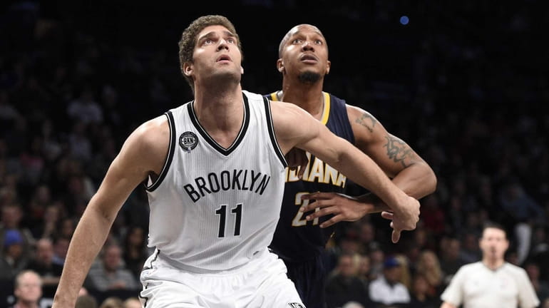 Brooklyn Nets center Brook Lopez and Indiana Pacers forward David...