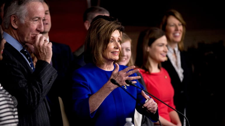 House Speaker Nancy Pelosi of Calif., accompanied by Chairman of...