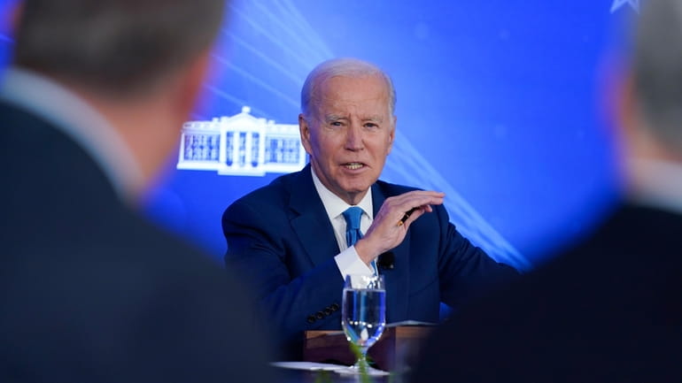 President Joe Biden speaks during a meeting with the President's...