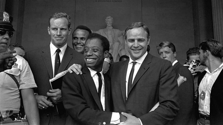 Marlon Brando, right center, at the Lincoln Memorial in 1963...