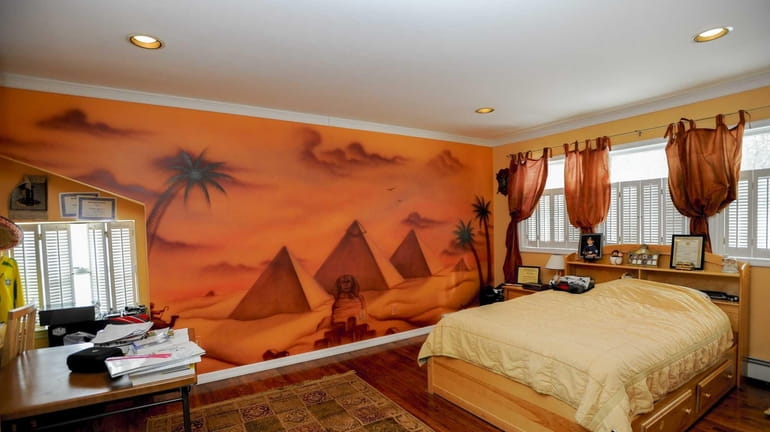 This Melville home includes several floor-to-ceiling-size murals of international scenes...