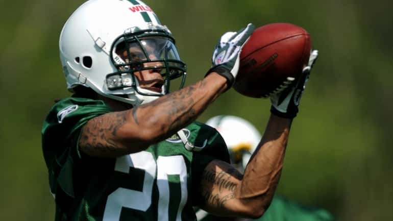 Jets cornerback Kyle Wilson practices during a rookie minicamp at...