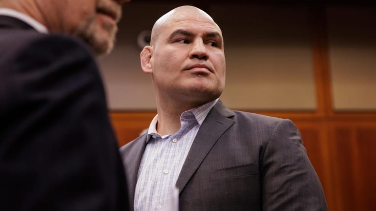 Cain Velasquez, right, appears for his arraignment with attorney Edward...