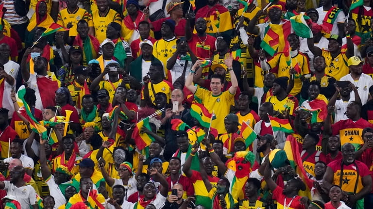 Fan of Ghana cheer during a World Cup group H...