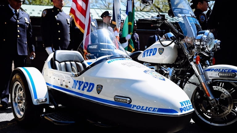 A motorcycle sidecar and a plaque were dedicated Thursday in...