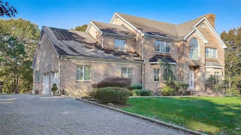 Priced at $995,000, this four-bedroom, 4½-bathroom home sits on a...