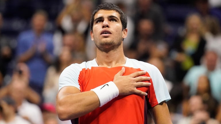 Carlos Alcaraz reacts to the crowd after defeating Frances Tiafoe...