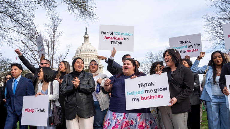 Devotees of TikTok gather at the Capitol in Washington, as...