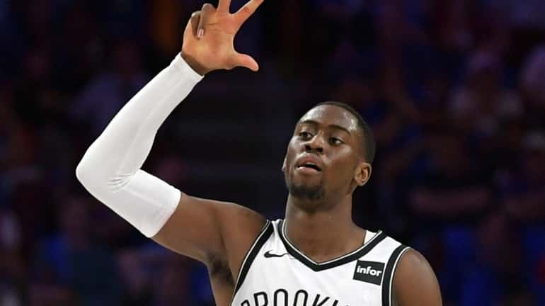 Caris LeVert of the Brooklyn Nets celebrates after a three-point...