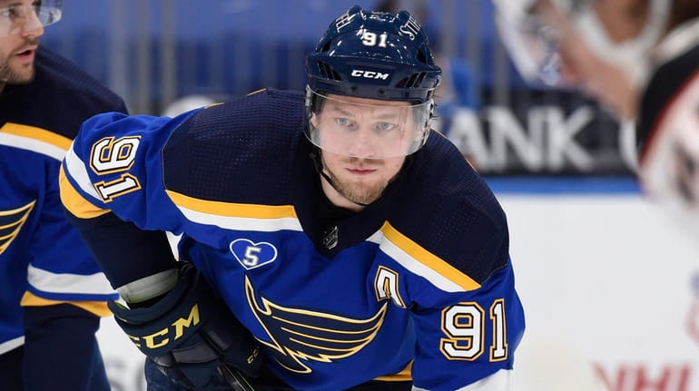 The Blues' Vladimir Tarasenko waits for a face-off during the third...