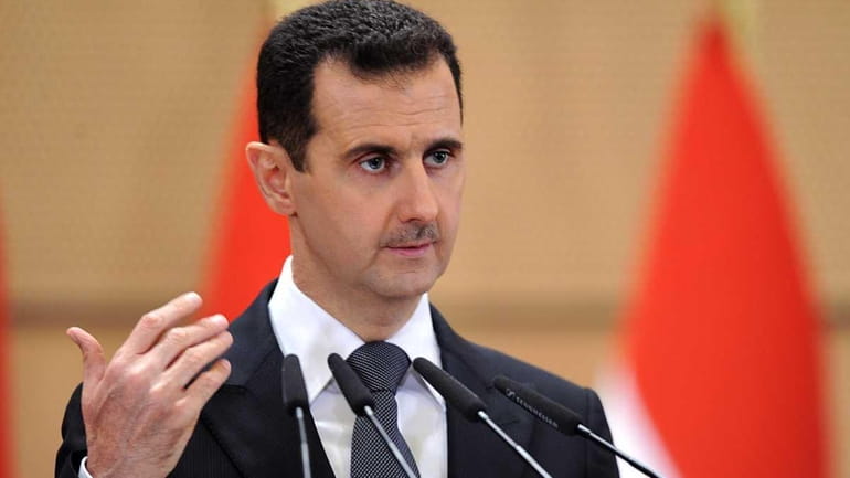 Syrian President Bashar Assad delivers a speech in Damascus, Syria,...