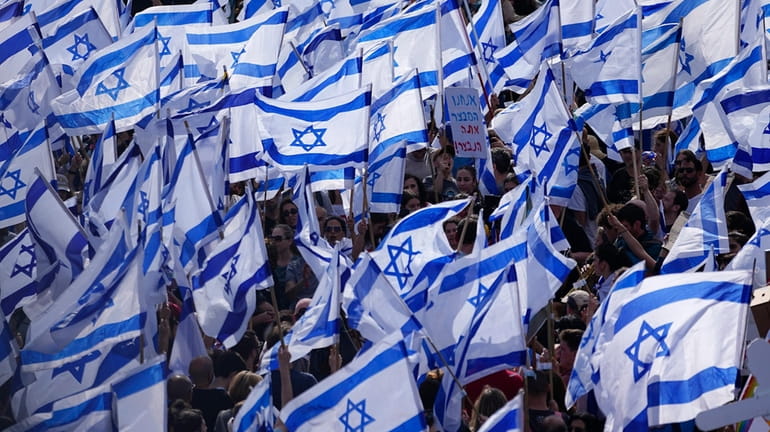 Israelis protest against Prime Minister Benjamin Netanyahu's judicial overhaul plan...