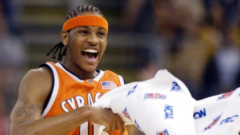 Syracuse's Carmelo Anthony celebrates during the first half against Kansas...