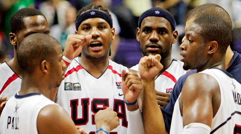 Members of the USA team, from left, Chris Paul, Carmelo...