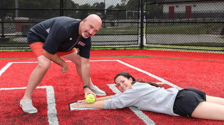 Renee McGowan, softball player at Bayport-Blue Point, and her father,...