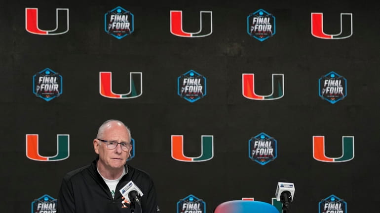 Miami head coach Jim Larranaga speaks during a news conference...