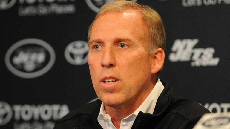 Jets general manager John Idzik speaks during a news conference...