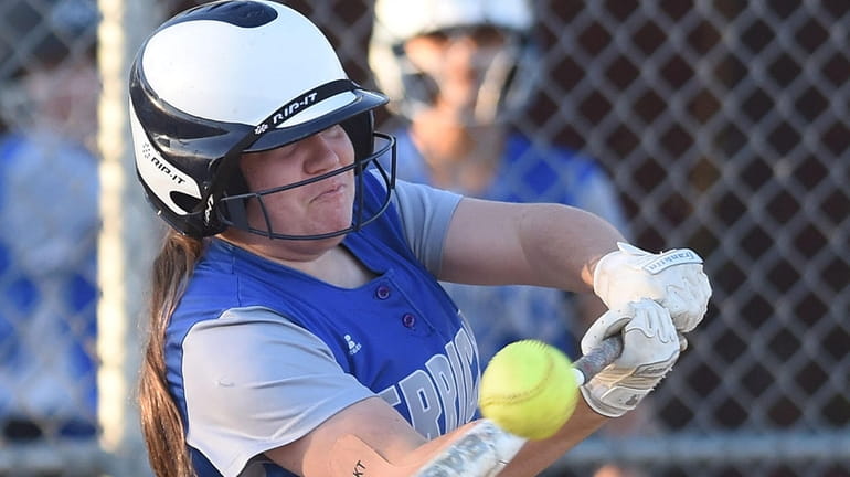 Halle Sacharoff, Herricks catcher, connects for a two-run double with...