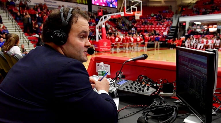 Josh Caray, play-by-play announcer for Stony Brook, calls basketball game...