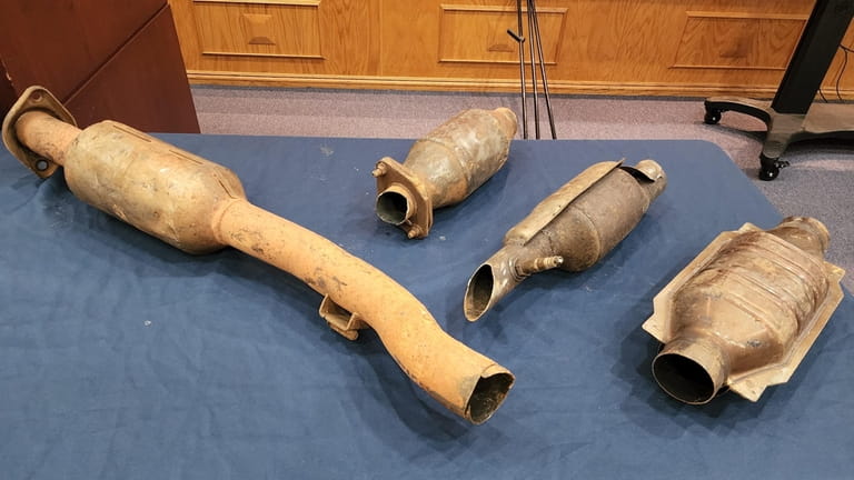 Stolen catalytic converter are displayed at Nassau police headquarters in Mineola...