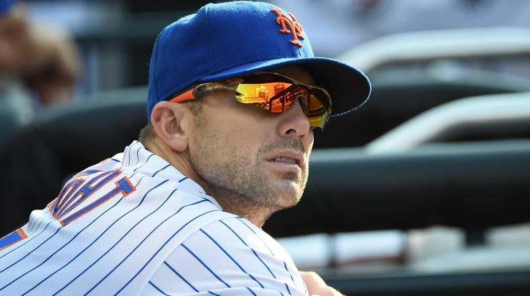 New York Mets third baseman David Wright looks on from...