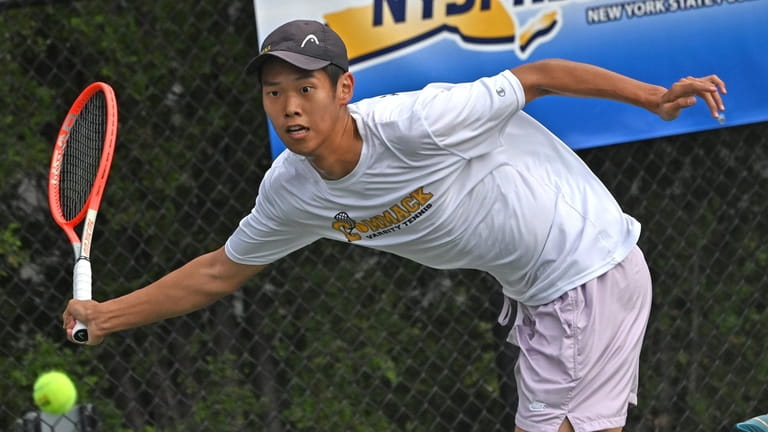 Edward Liao of Commack competes in the singles finals of...