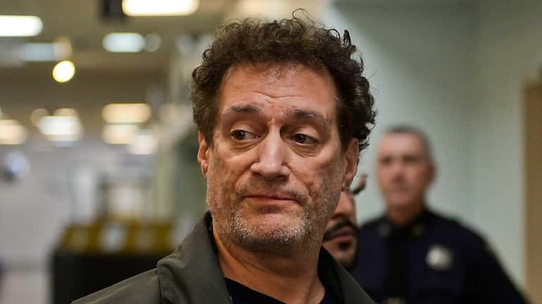 Controversial broadcaster Anthony Cumia leaves First District Court in Hempstead...