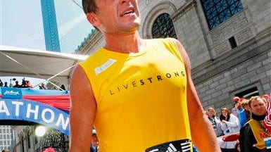 Lance Armstrong cools off after finishing the Boston Marathon. (April...