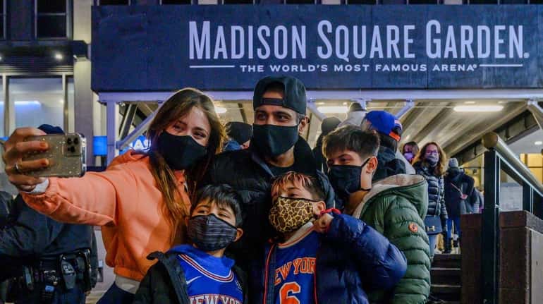 The Quershif family takes a selfie outside Madison Square Garden...