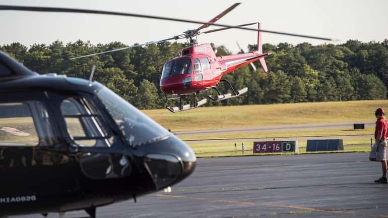 Helicopter traffic at the East Hampton Town Airport in Wainscott,...