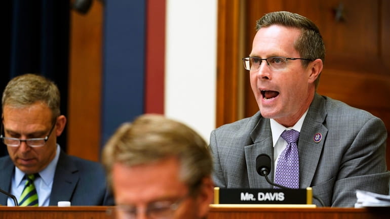 U.S. Rep. Rodney Davis, R-Ill., right, speaks during a House...