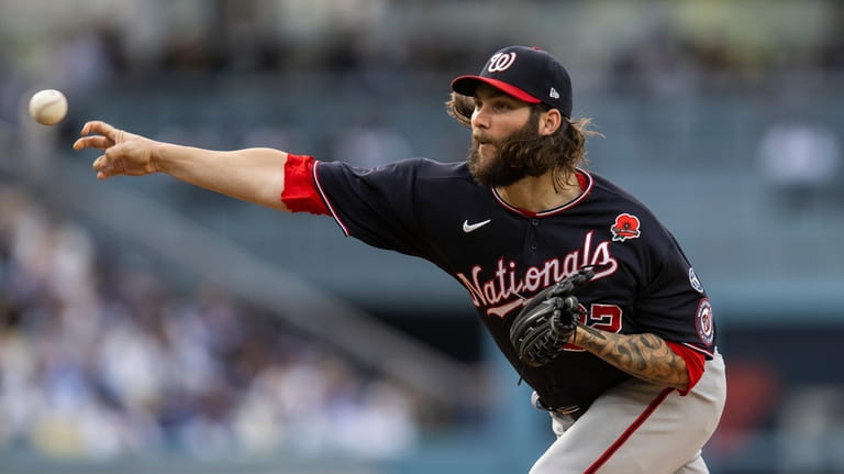 Washington Nationals starting pitcher Trevor Williams throws during the first...
