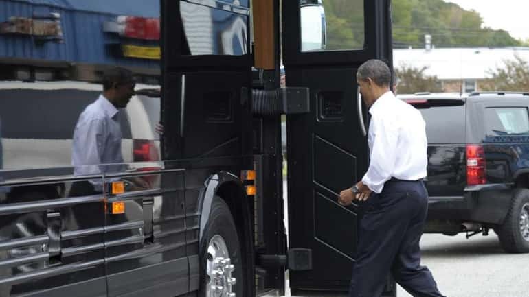President Barack Obama heads to his bus after having lunch...