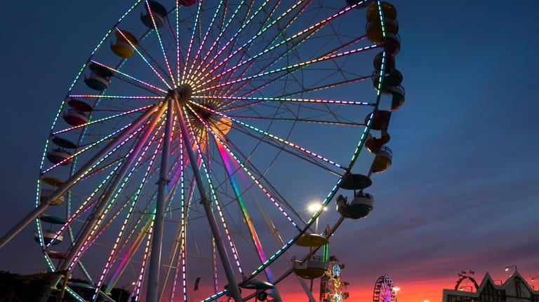The giant Ferris wheel at the Empire State Fair, at...