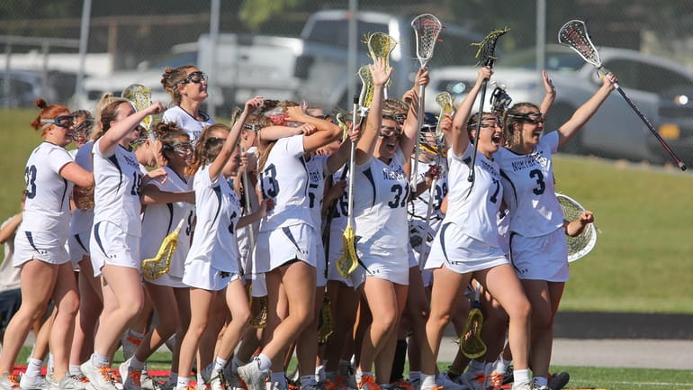 Northport celebrates their win during the Suffolk High School Girls...