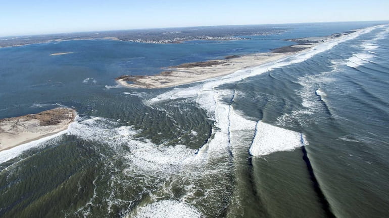 The breach on Fire Island caused by superstorm Sandy is...
