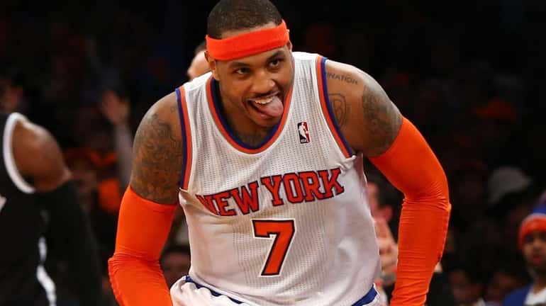 Carmelo Anthony celebrates a 3-pointer in the second half of...