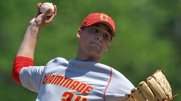 Chaminade starting pitcher Frank Sommers delivers to the plate in...