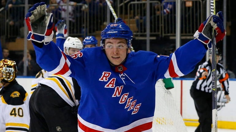 The Rangers' Jimmy Vesey celebrates a goal against the Bruins...