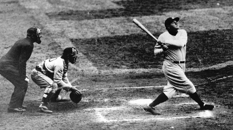 New York Yankees' Babe Ruth hits a home run in...