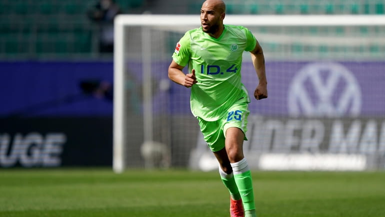 FILE - Wolfsburg's John Brooks plays the ball during the...