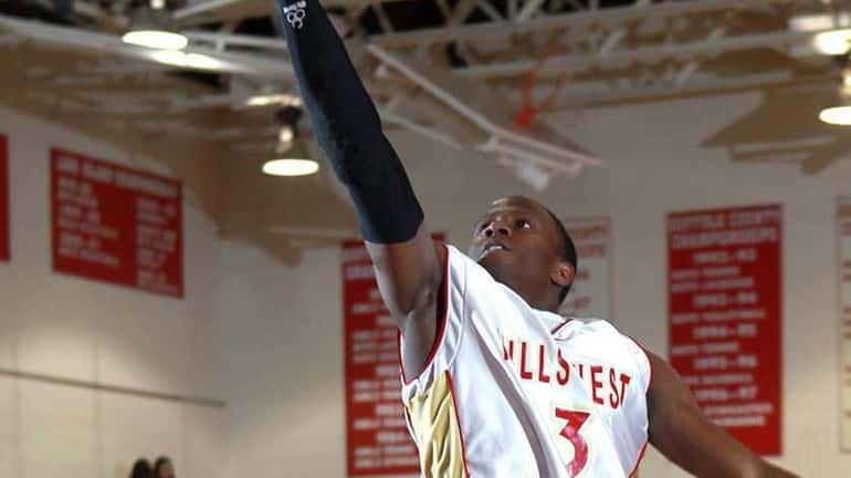Hills West's Tavon Sledge (3) with the layup off a...