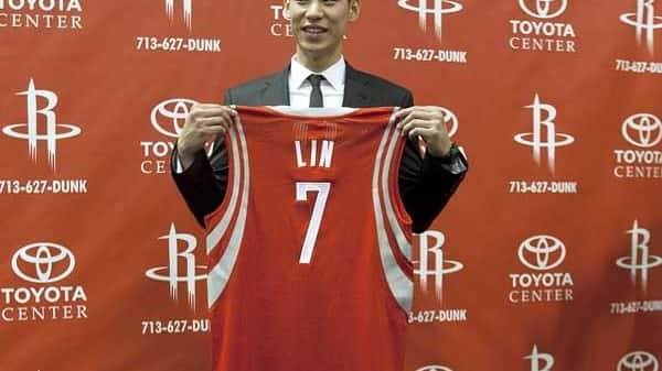 Jeremy Lin of the Houston Rockets displays his jersey. (Getty)