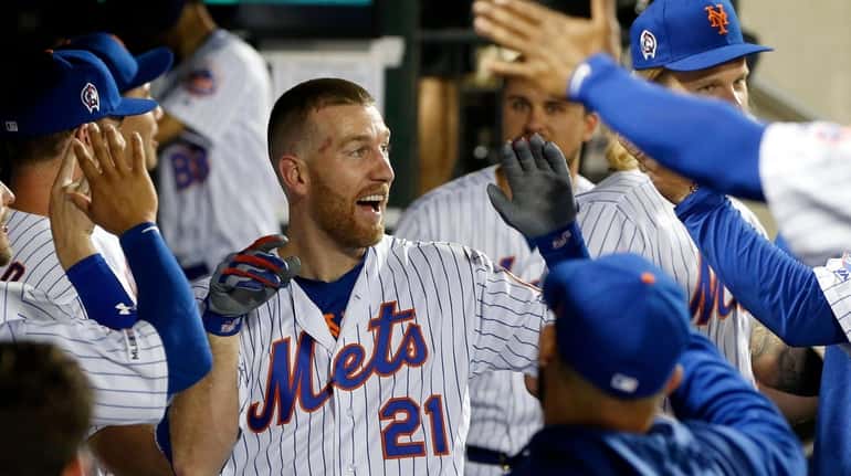 Todd Frazier #21 of the New York Mets celebrates his...
