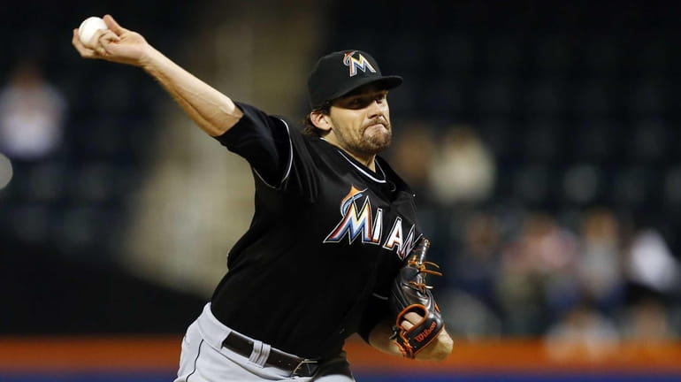 Nathan Eovaldi of the Miami Marlins pitches in the second...
