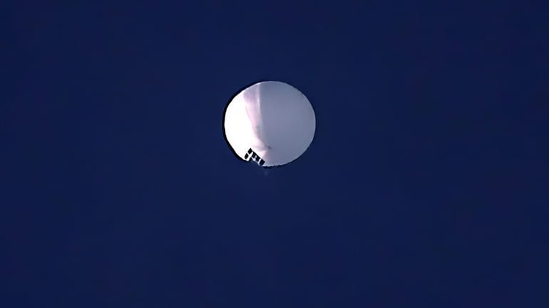 A high altitude balloon floats over Billings, Mont., on Wednesday,...