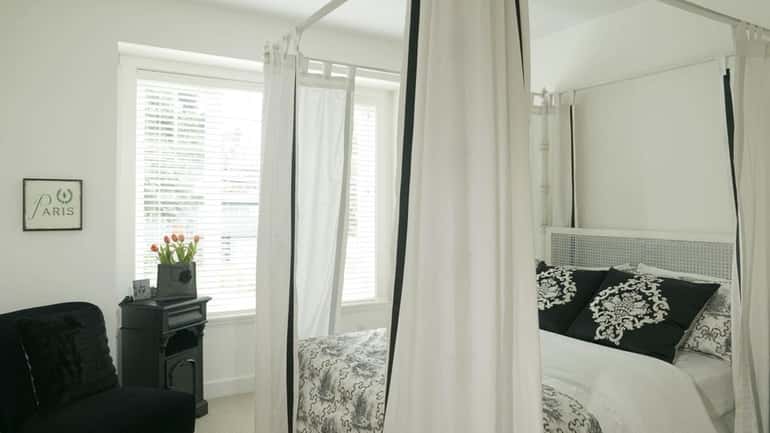 This all-white bedroom looks fabulous and restfully cool with its...