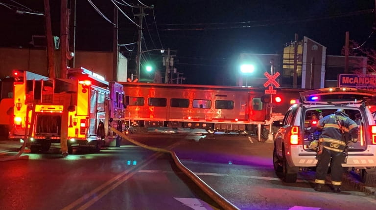 Fire department onscene of a train hitting a car with...